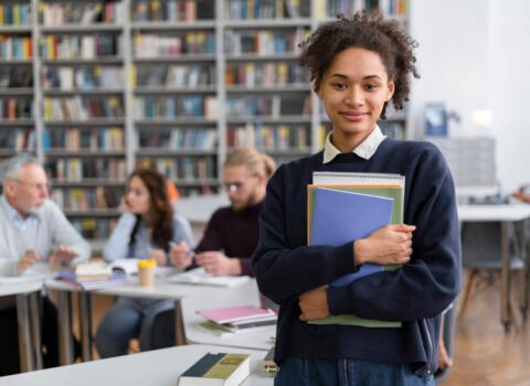 medium-shot-student-holding-books